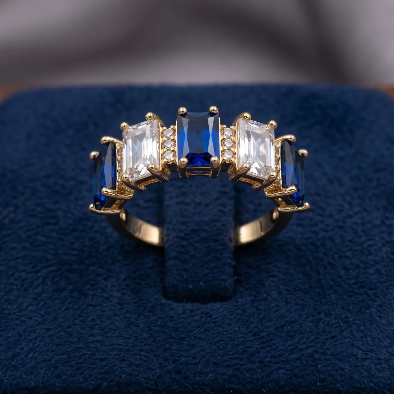 vibrant gold ring adorned with colorful gemstones,